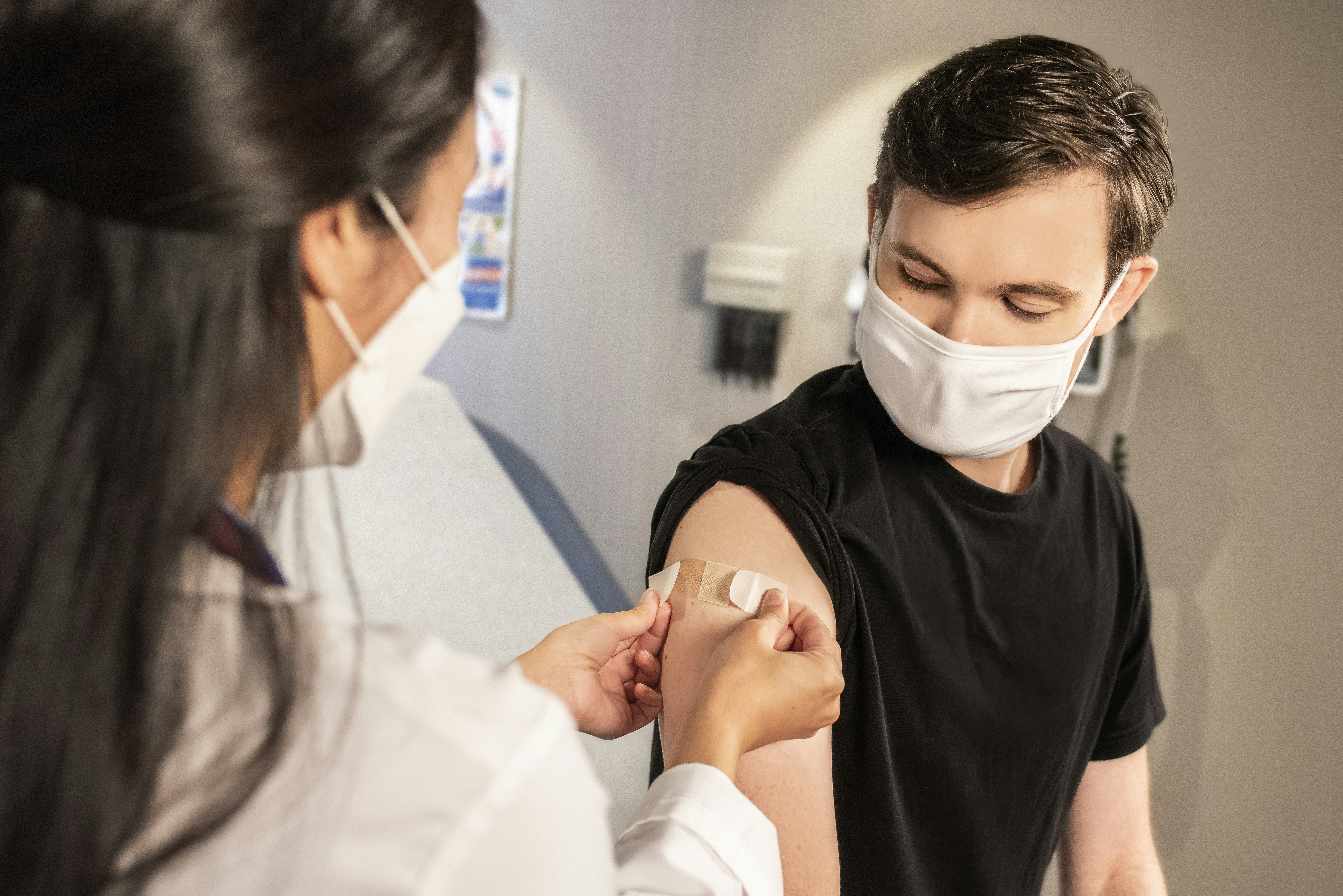 Healthcare worker administering vaccine