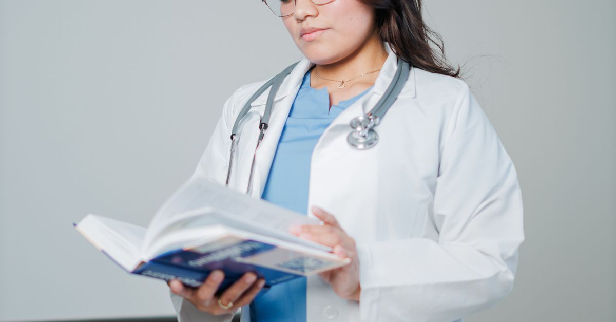 Doctor reviewing medical research representing clinical trial for ITP treatment