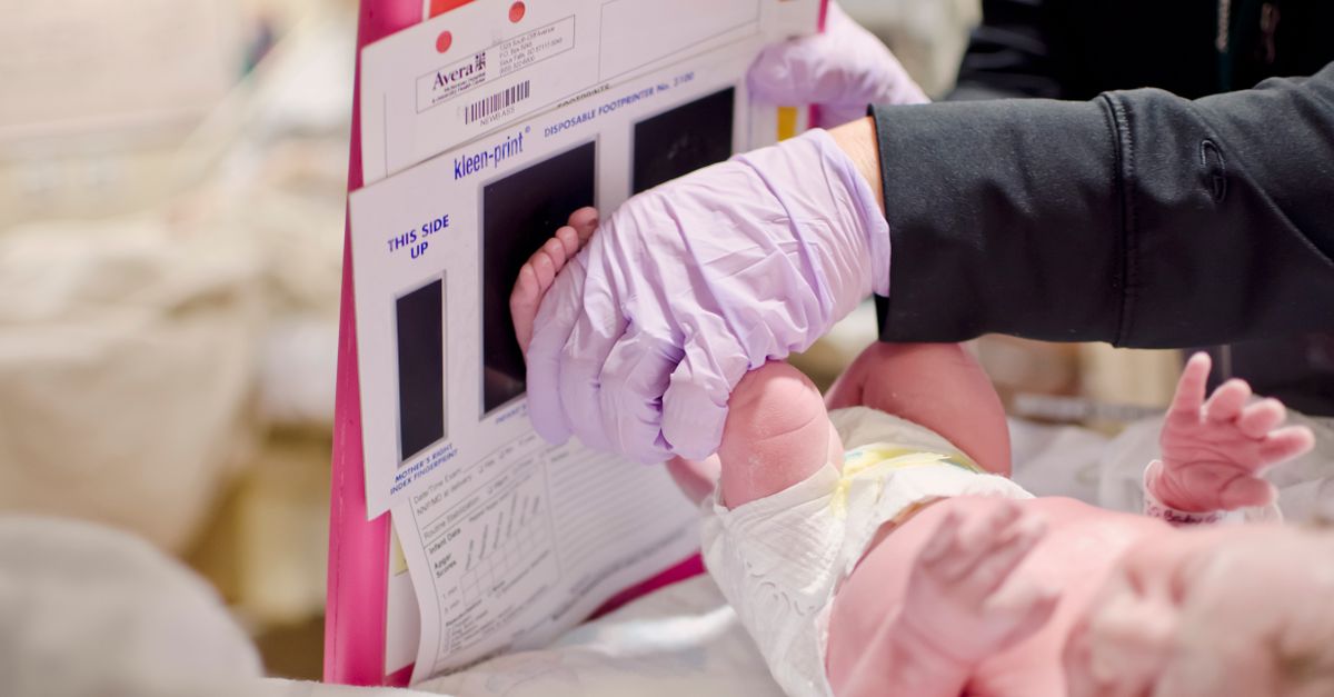 Newborn baby receiving hospital care representing pediatric genetic disease treatment