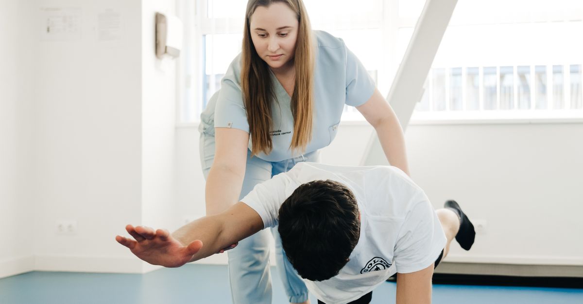 Physical therapy session representing rehabilitation for muscle weakness in Pompe disease