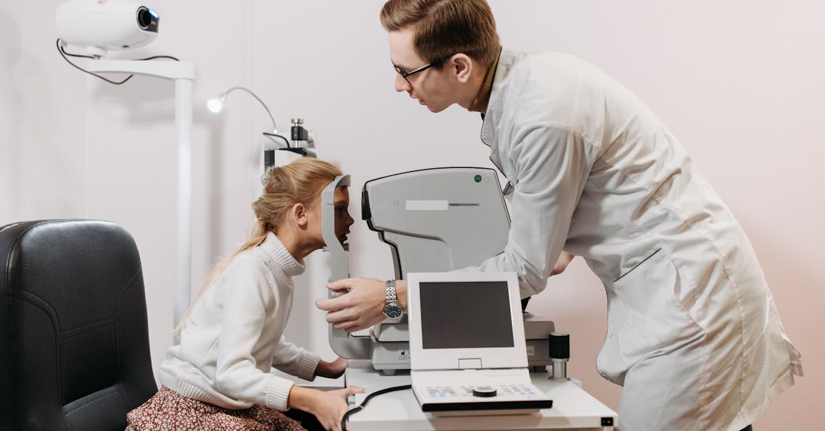 An optometrist conducting an eye examination with modern equipment in a clinic