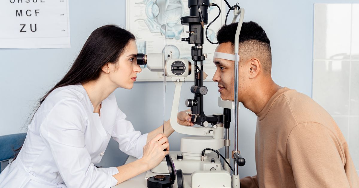 Optometrist conducting professional eye examination