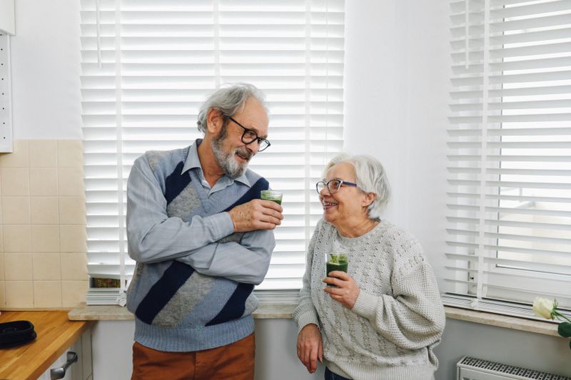 Senior couple enjoying healthy smoothies and nutrition