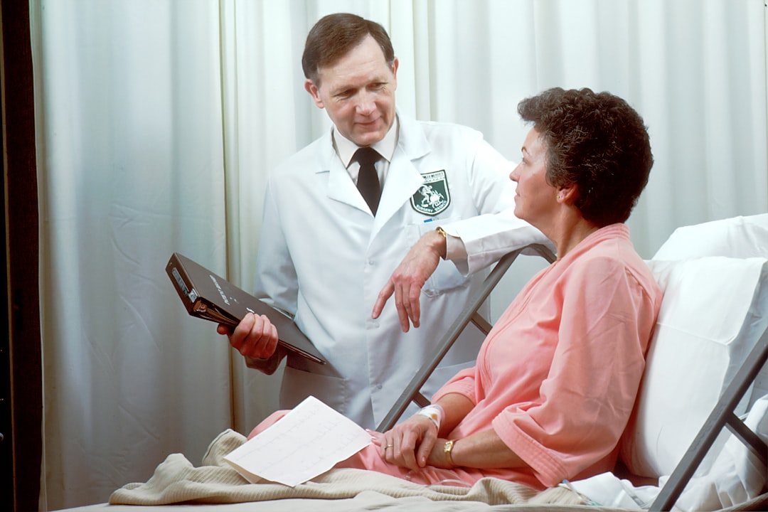 Doctor consulting with patient