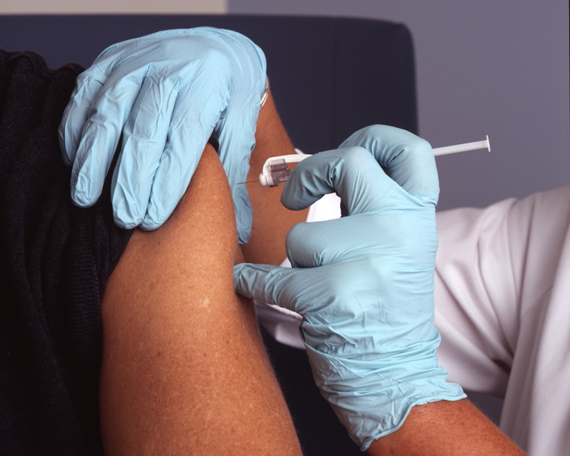 Nurse administering a vaccine injection