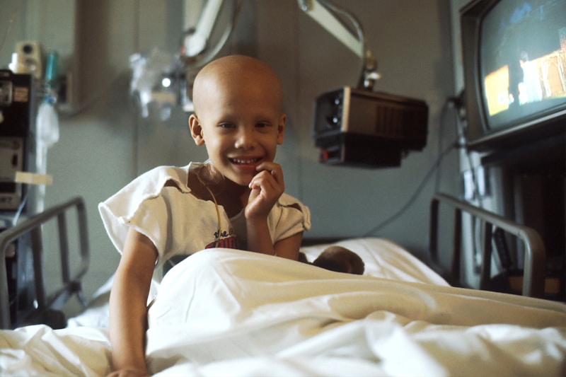 Young patient receiving chemotherapy treatment