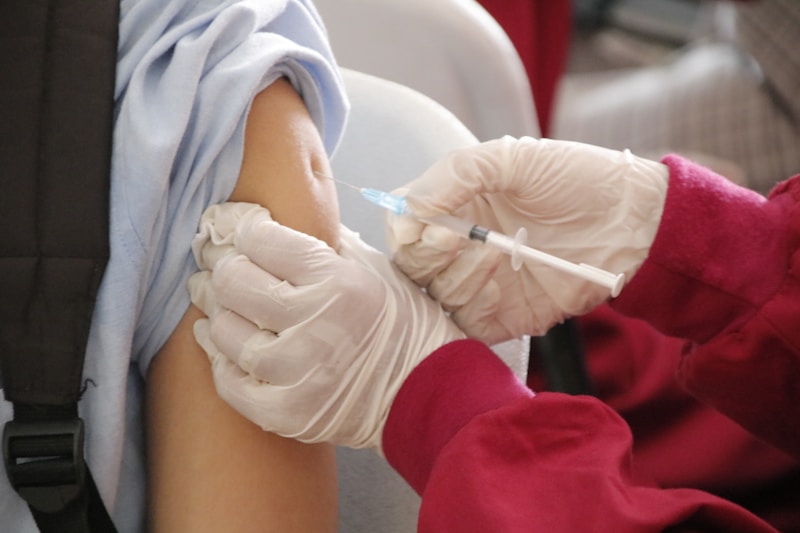 Patient receiving vaccine injection